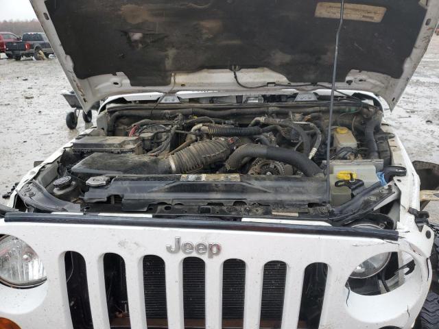 Photo 11 from auction – 2011 JEEP WRANGLER U with VIN 1J4BA5H13BL632714