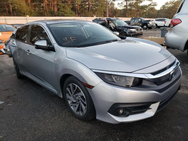 Photo 4 from auction – 2018 HONDA CIVIC EX with VIN 19XFC2F72JE032782