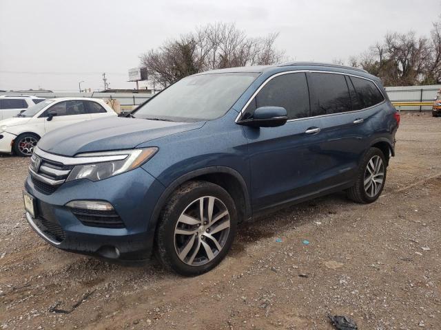 Photo 1 from auction – 2017 HONDA PILOT TOUR with VIN 5FNYF5H93HB032228