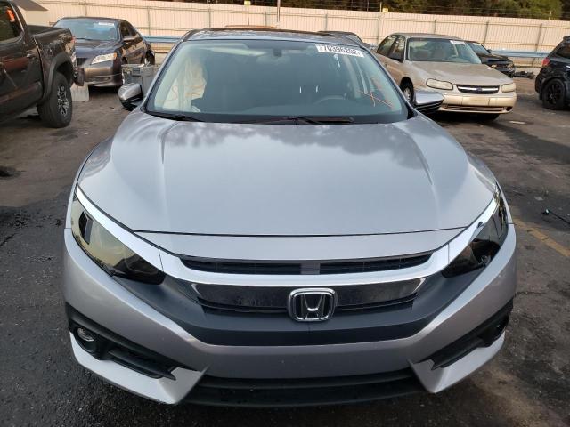 Photo 5 from auction – 2018 HONDA CIVIC EX with VIN 19XFC2F72JE032782