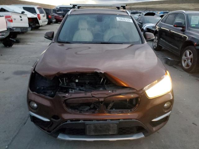 Photo 5 from auction – 2016 BMW X1 XDRIVE2 with VIN WBXHT3C37G5E53231