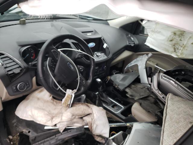 Photo 8 from auction – 2017 FORD ESCAPE TIT with VIN 1FMCU9J94HUE43948