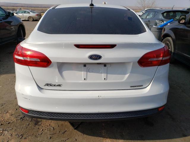 Photo 6 from auction – 2015 FORD FOCUS S with VIN 1FADP3E26FL261557