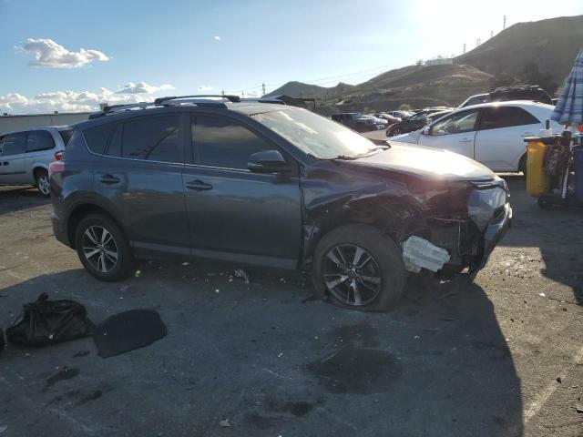Photo 4 from auction – 2016 TOYOTA RAV4 XLE with VIN JTMWFREVXGD088818