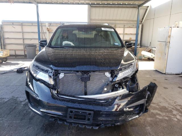Photo 5 from auction – 2022 HONDA PILOT TOUR with VIN 5FNYF5H64NB013382