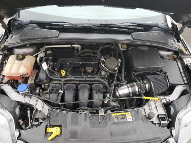 Photo 11 from auction – 2014 FORD FOCUS TITA with VIN 1FADP3N26EL160565