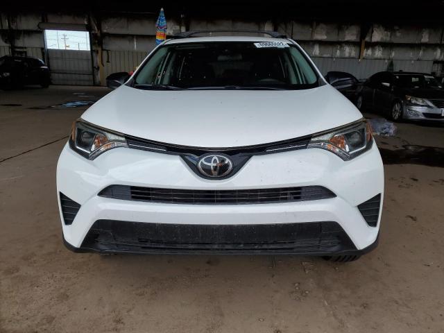 Photo 5 from auction – 2018 TOYOTA RAV4 LE with VIN JTMZFREV1JJ185802