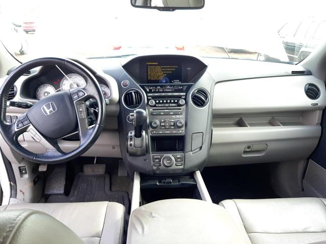 Photo 8 from auction – 2015 HONDA PILOT TOUR with VIN 5FNYF4H99FB034640