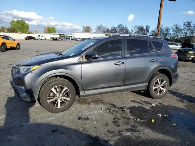 TOYOTA RAV4 XLE 2016 with VIN JTMWFREVXGD088818 - Photo from auction