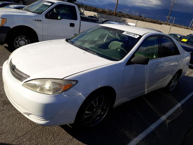 TOYOTA CAMRY LE 2002 with VIN JTDBE32K720092978 - Photo from auction