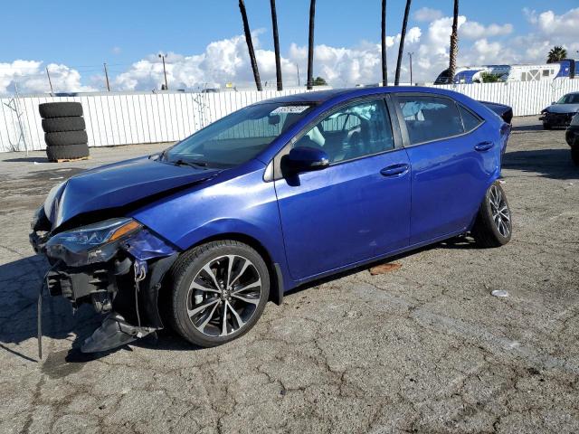 TOYOTA COROLLA L 2017 with VIN 5YFBURHE9HP613477 - Photo from auction