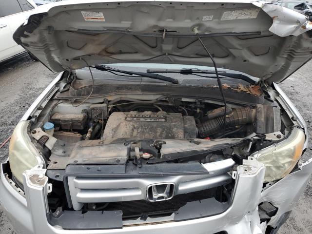 Photo 12 from auction – 2006 HONDA PILOT LX with VIN 2HKYF18166H557320
