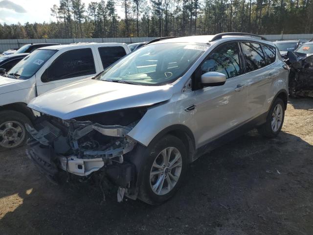 FORD ESCAPE SE 2018 with VIN 1FMCU0GD9JUC12945 - Photo from auction