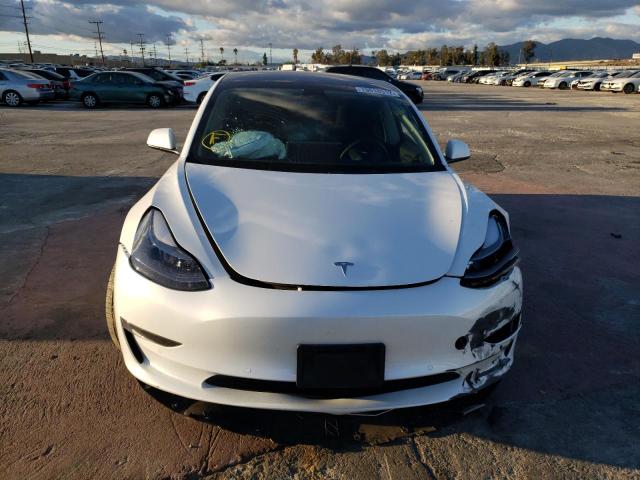 Photo 5 from auction – 2022 TESLA MODEL 3 with VIN 5YJ3E1EA5NF194121