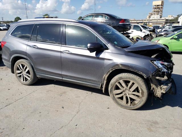 Photo 4 from auction – 2017 HONDA PILOT TOUR with VIN 5FNYF5H98HB001296