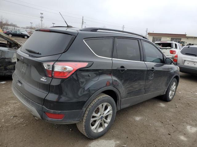 Photo 3 from auction – 2017 FORD ESCAPE SE with VIN 1FMCU9G97HUB58507