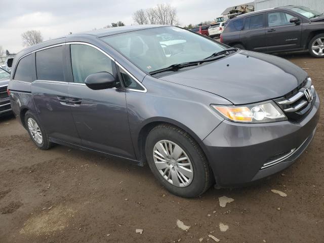 Photo 4 from auction – 2014 HONDA ODYSSEY LX with VIN 5FNRL5H24EB030693