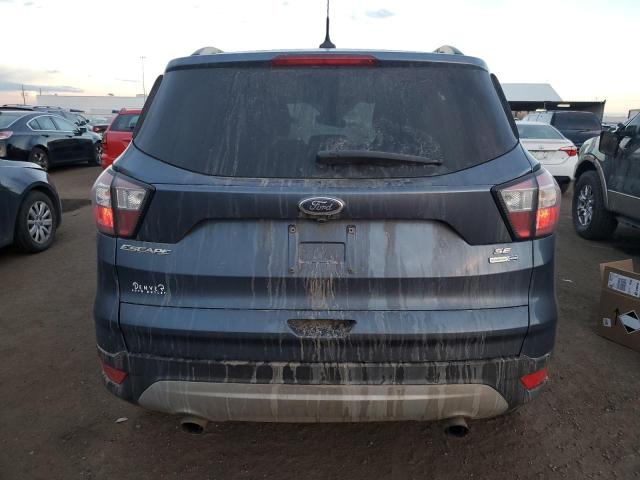 Photo 6 from auction – 2018 FORD ESCAPE SE with VIN 1FMCU9GD8JUC37985