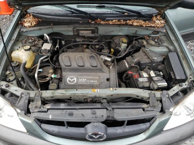 Photo 12 from auction – 2003 MAZDA TRIBUTE LX with VIN 4F2YZ04163KM42995