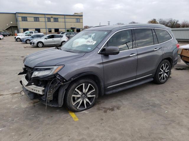 HONDA PILOT TOUR 2019 with VIN 5FNYF5H96KB043165 - Photo from auction