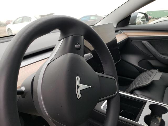 Photo 9 from auction – 2022 TESLA MODEL 3 with VIN 5YJ3E1EAXNF368572