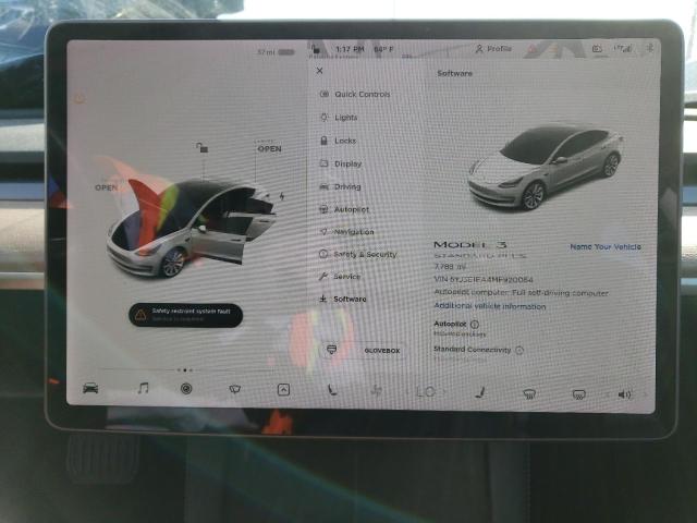 Photo 9 from auction – 2021 TESLA MODEL 3 with VIN 5YJ3E1EA4MF920064