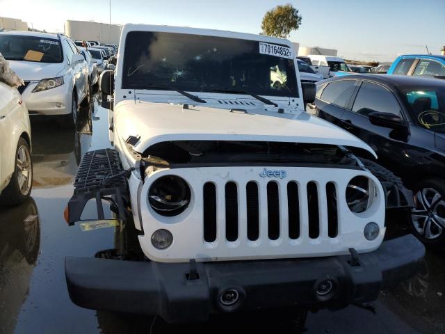 Photo 5 from auction – 2014 JEEP WRANGLER U with VIN 1C4BJWEG8EL309042