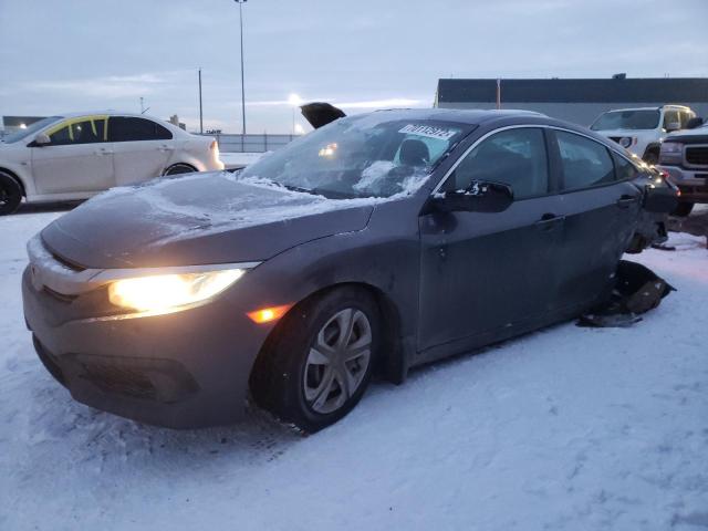 HONDA CIVIC LX 2018 with VIN 2HGFC2E50JH016831 - Photo from auction