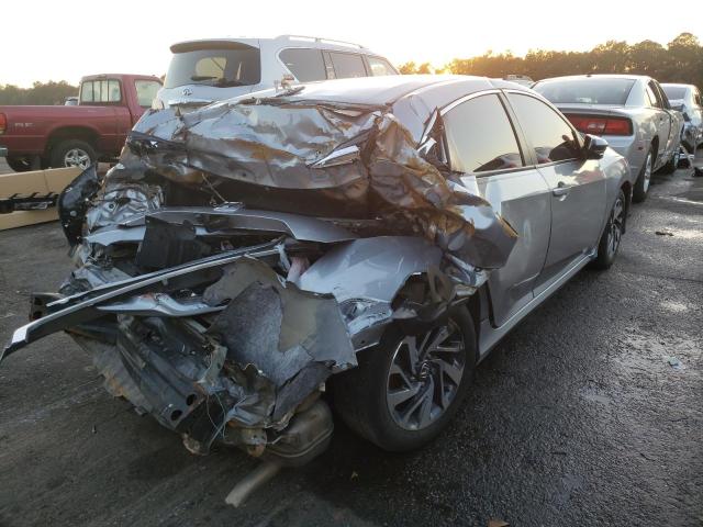 Photo 3 from auction – 2018 HONDA CIVIC EX with VIN 19XFC2F72JE032782