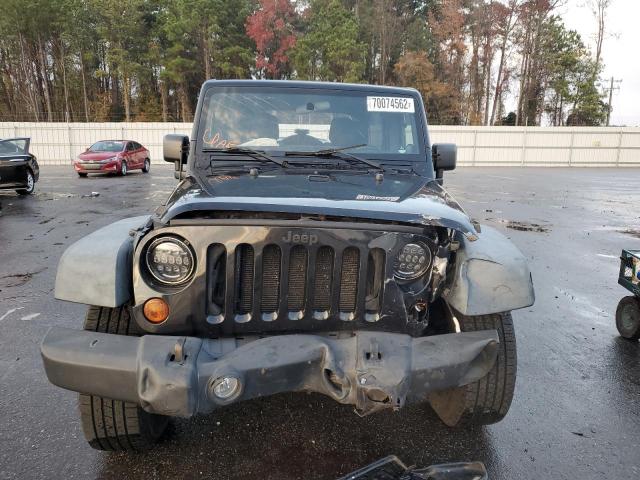 Photo 5 from auction – 2011 JEEP WRANGLER U with VIN 1J4BA6H16BL593266