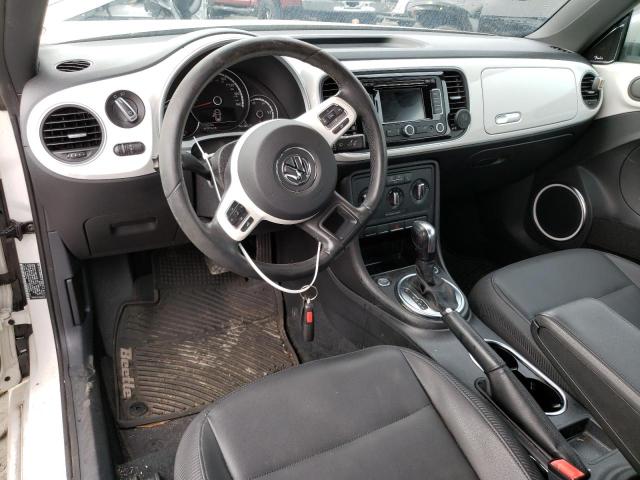 Photo 8 from auction – 2013 VOLKSWAGEN BEETLE with VIN 3VWJP7AT5DM674744