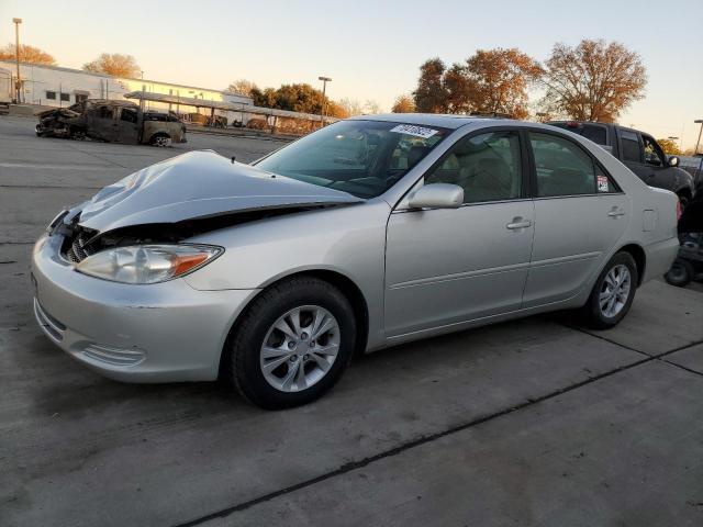 TOYOTA CAMRY LE 2004 with VIN 4T1BF32K64U583191 - Photo from auction