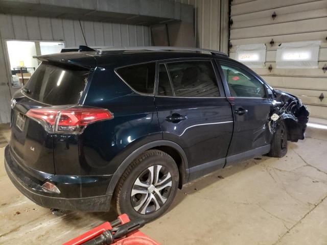 Photo 3 from auction – 2018 TOYOTA RAV4 LE with VIN 2T3ZFREV4JW445305