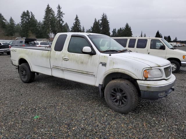 Photo 4 from auction – 2001 FORD F150 with VIN 1FTRX18L31NB71515