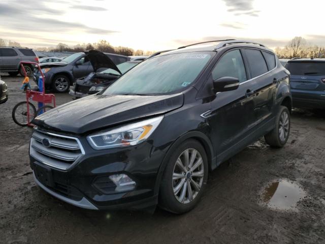 FORD ESCAPE TIT 2018 with VIN 1FMCU9J99JUB01787 - Photo from auction