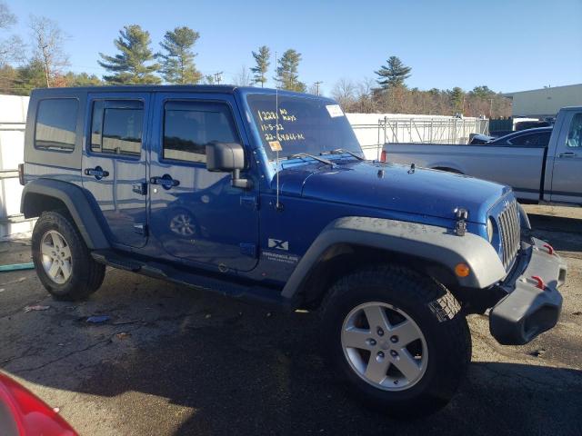 Photo 4 from auction – 2009 JEEP WRANGLER U with VIN 1J4GA39169L754809