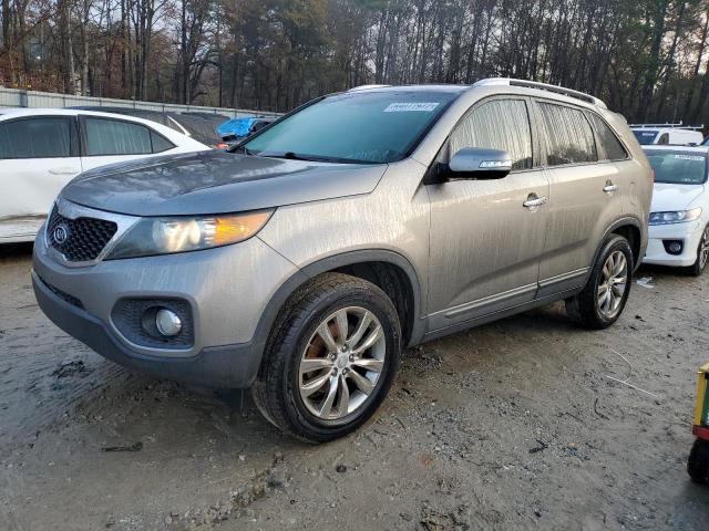 KIA SORENTO EX 2011 with VIN 5XYKU4A20BG107552 - Photo from auction