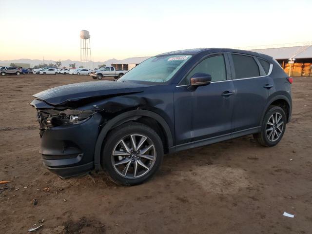 MAZDA CX-5 TOURI 2018 with VIN JM3KFACM6J0409396 - Photo from auction