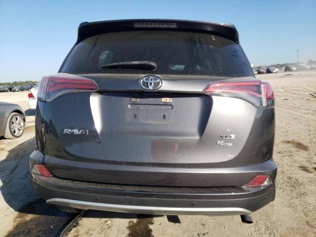 Photo 6 from auction – 2017 TOYOTA RAV4 XLE with VIN JTMWFREV7HJ101219