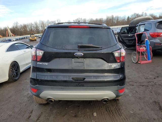 Photo 6 from auction – 2018 FORD ESCAPE TIT with VIN 1FMCU9J99JUB01787