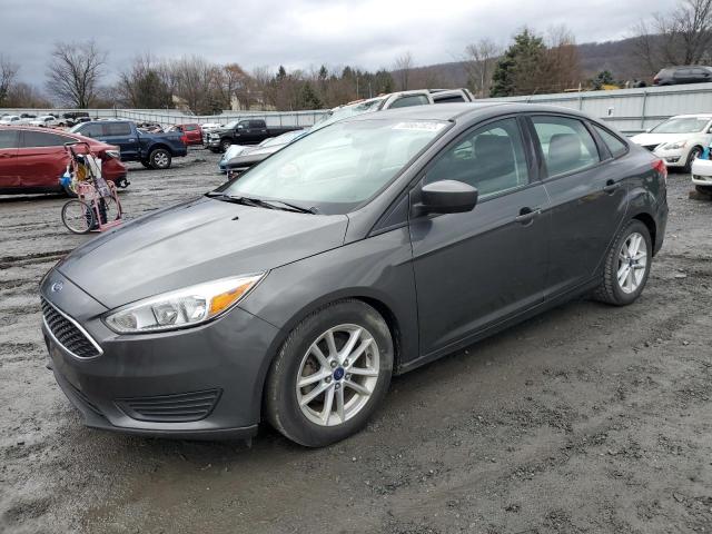 FORD FOCUS SE 2018 with VIN 1FADP3F2XJL298523 - Photo from auction