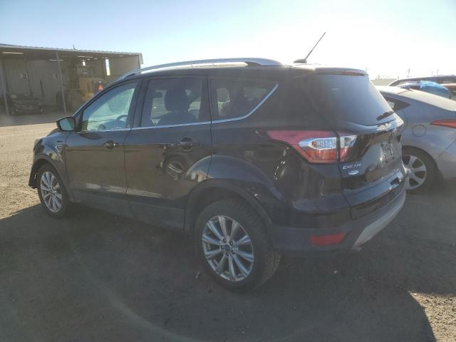 Photo 2 from auction – 2017 FORD ESCAPE TIT with VIN 1FMCU9J91HUC50088