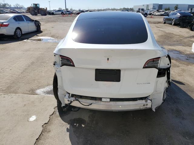 Photo 6 from auction – 2022 TESLA MODEL Y with VIN 7SAYGAEE1NF432536