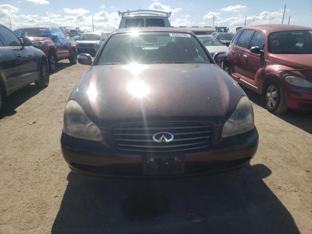 Photo 5 from auction – 2002 INFINITI Q45 with VIN JNKBF01A72M000585