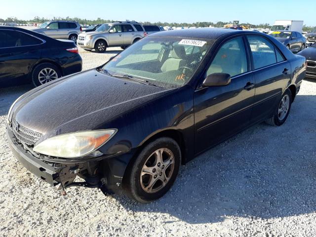 TOYOTA CAMRY LE 2003 with VIN 4T1BE32K23U712075 - Photo from auction