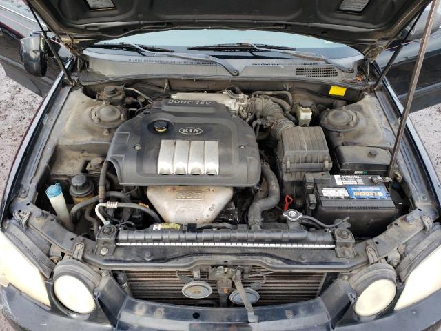 Photo 11 from auction – 2004 KIA OPTIMA LX with VIN KNAGD126645297906