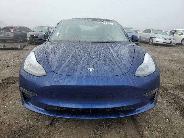 Photo 5 from auction – 2022 TESLA MODEL 3 with VIN 5YJ3E1EB1NF313243