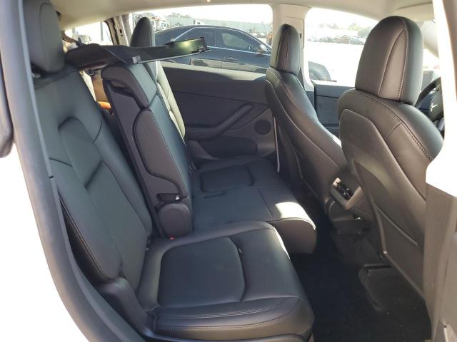 Photo 11 from auction – 2022 TESLA MODEL Y with VIN 7SAYGAEE1NF432536