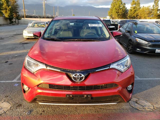 Photo 5 from auction – 2016 TOYOTA RAV4 XLE with VIN 2T3RFREV0GW418322