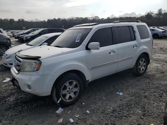 HONDA PILOT TOUR 2011 مع رقم تعريف المركبة 5FNYF4H94BB015228 - صورة من المزاد
